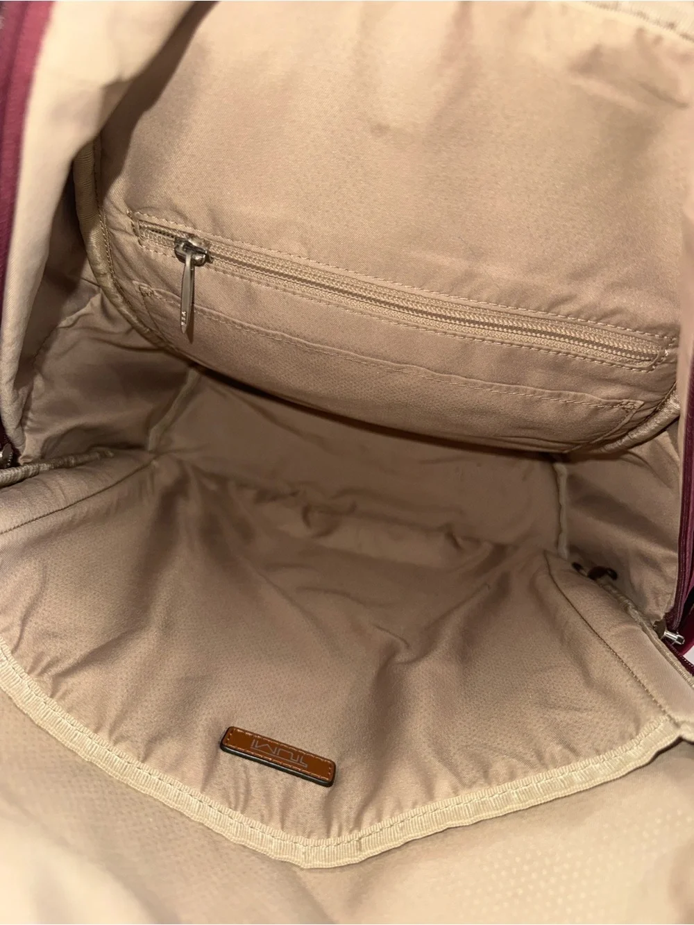 Tumi Burgundy nylon travel Backpack with several pockets